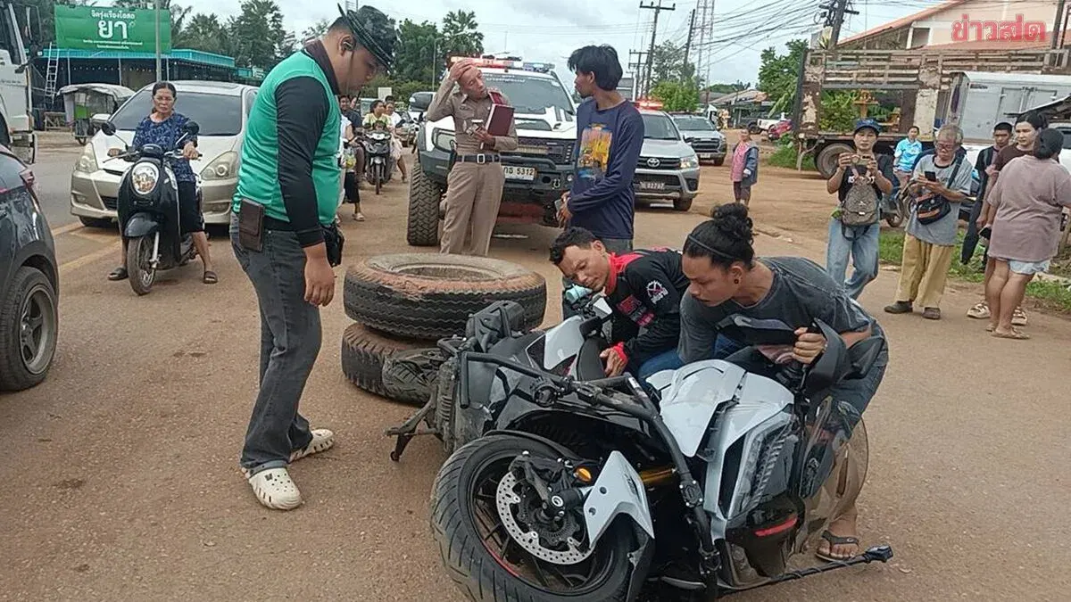 Truck Wheels Kill Two Teachers At Red Light
