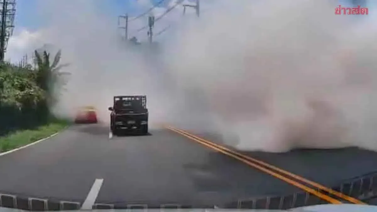 Vehicle Billows White Smoke on Phuket Mountain Road