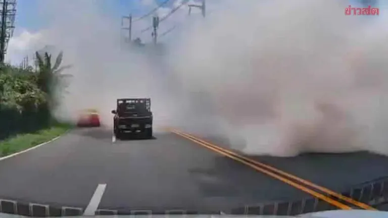 Vehicle Billows White Smoke on Phuket Mountain Road