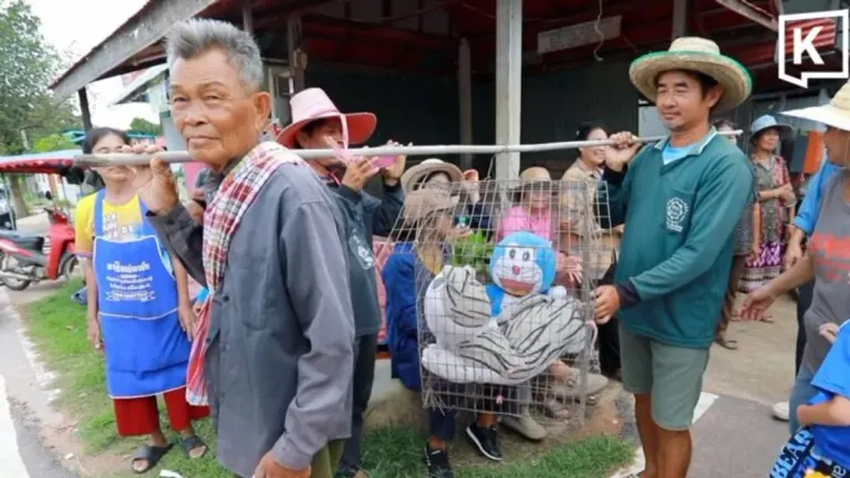 Khon Kaen Village Revives Rain Ritual With Doraemon Dolls