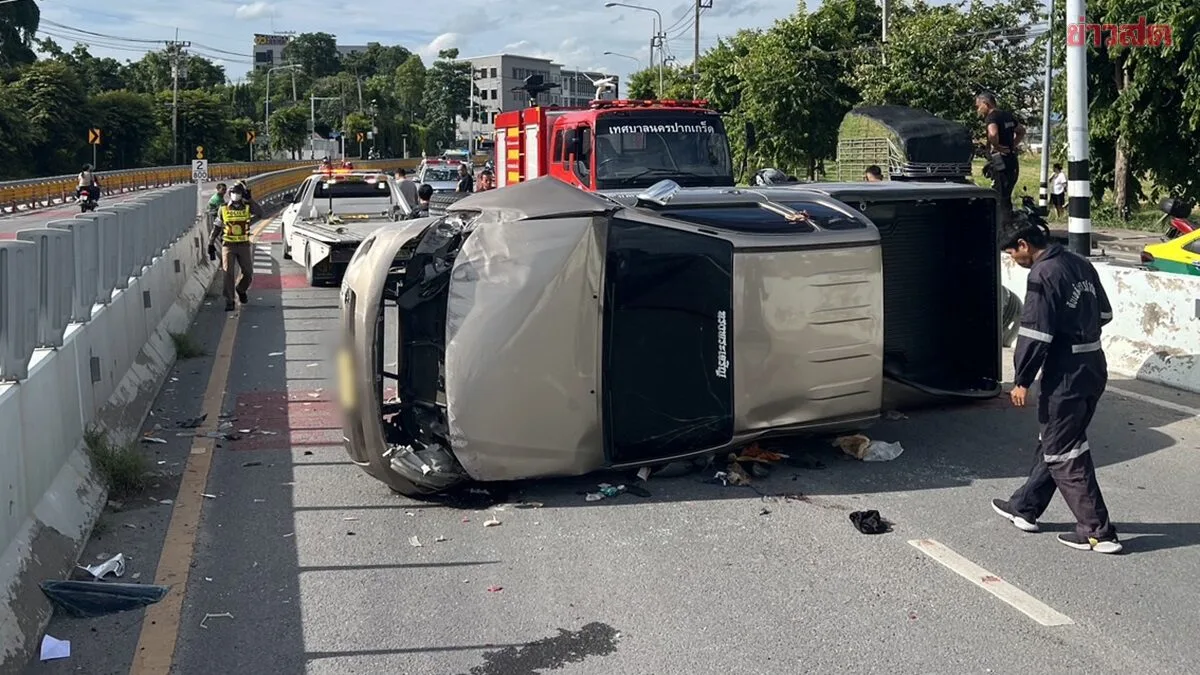 Rescuers Revive Driver After Truck Flips Near Bangkok