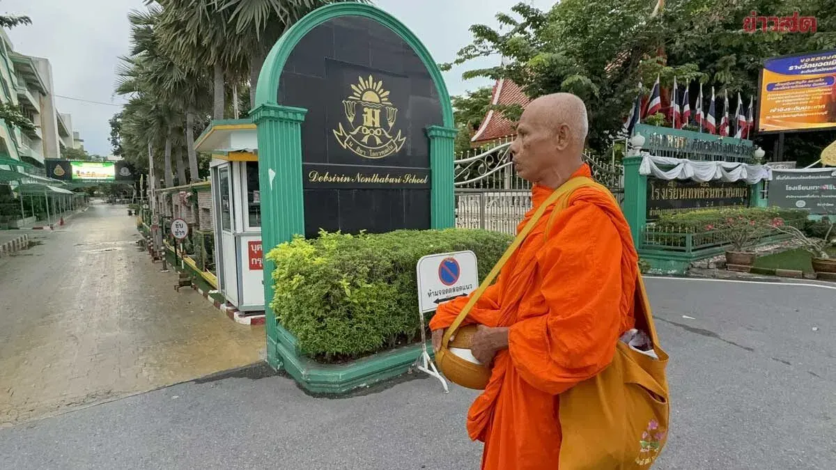 Monks Offer Prayers at Thepsirin School After Shooting
