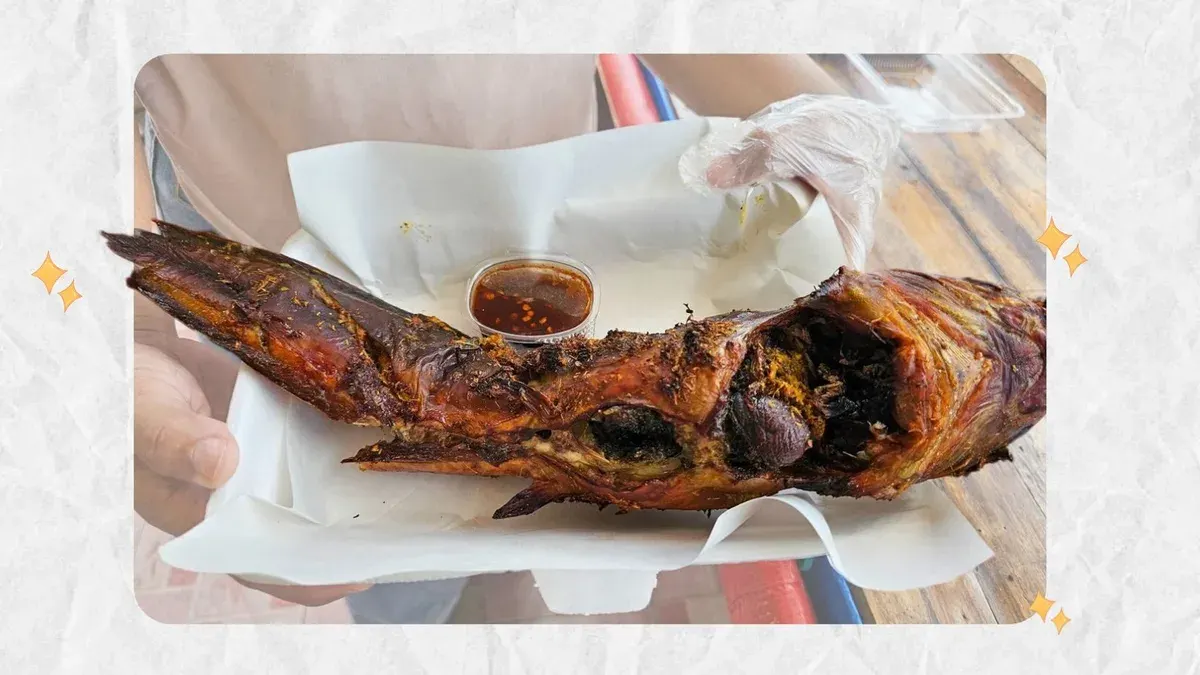 Kamphaeng Phet Vendor Crafts Signature Herb-Grilled Catfish Dish