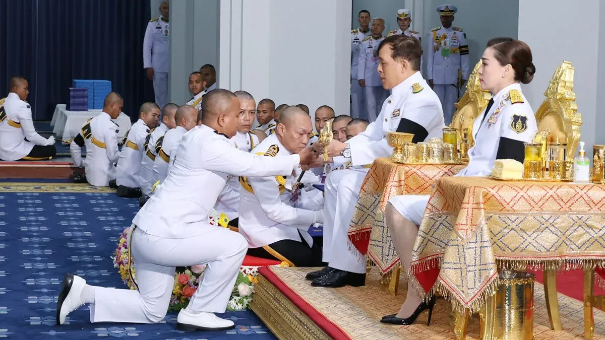King and Queen Confer Swords and Diplomas to Military Academy Graduates
