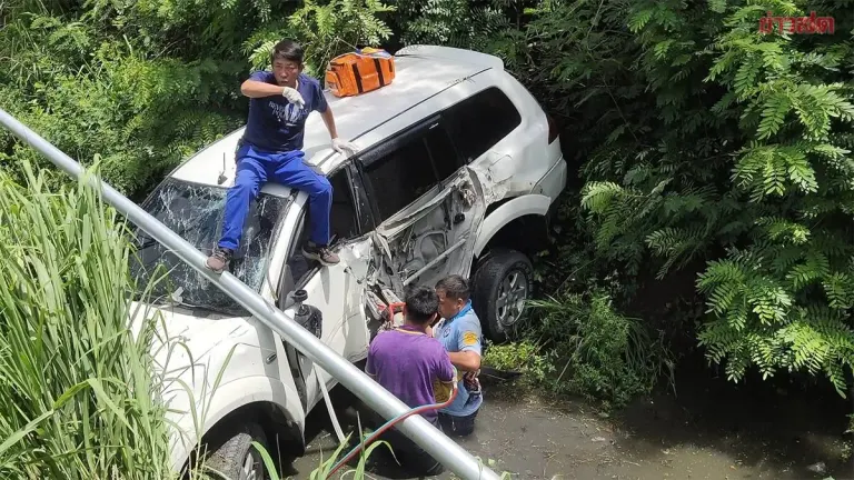 Woman Dies After Swerving Motorcycle, Car Plunges Into Canal