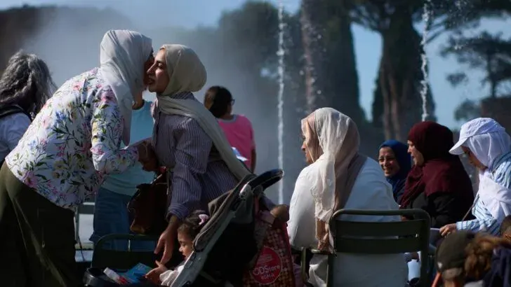 Families evacuated from Gaza enjoy a day to decompress at Rome's ancient baths