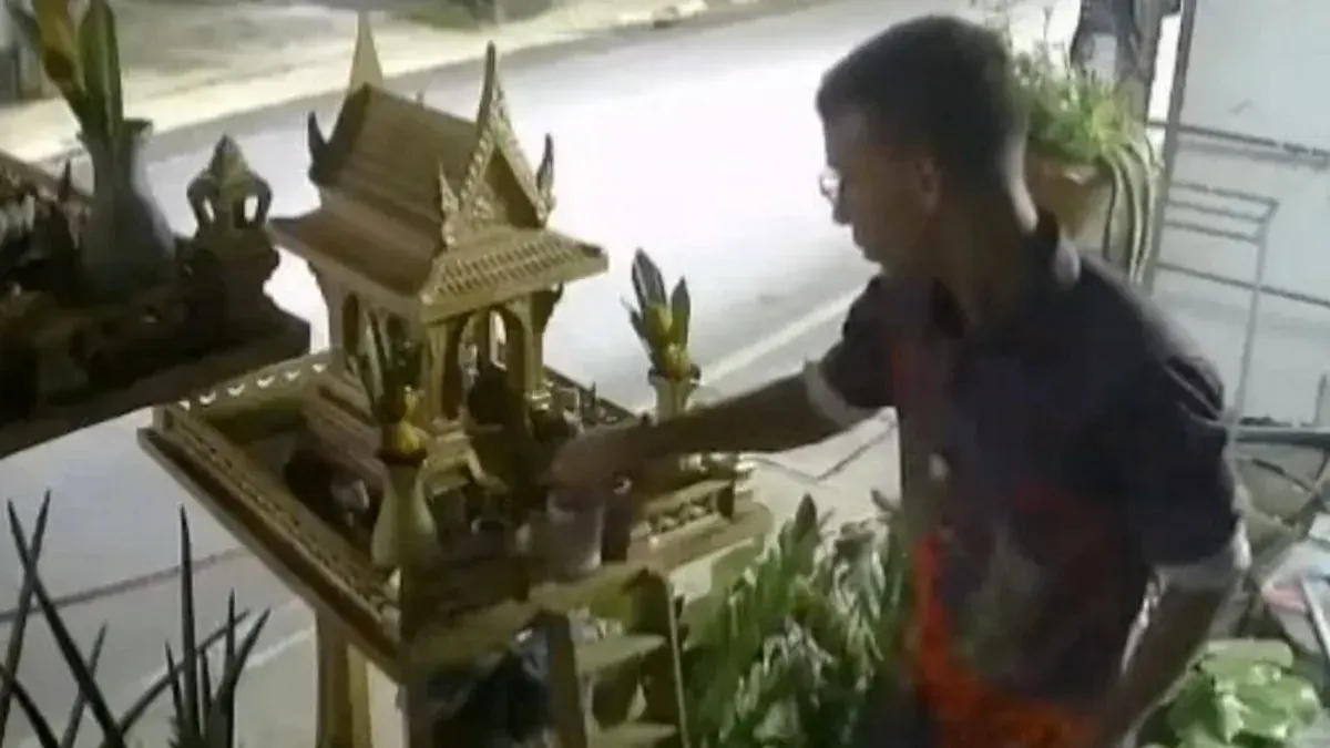 Foreigner Caught Stealing Spirit House Offerings in Phuket