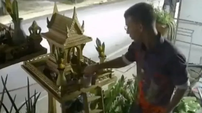 Foreigner Caught Stealing Spirit House Offerings in Phuket