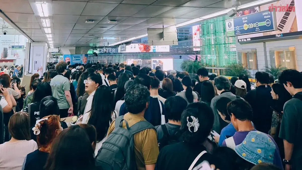 Heavy Rain Drives Bangkok Commuters to Crowded Mass Transit