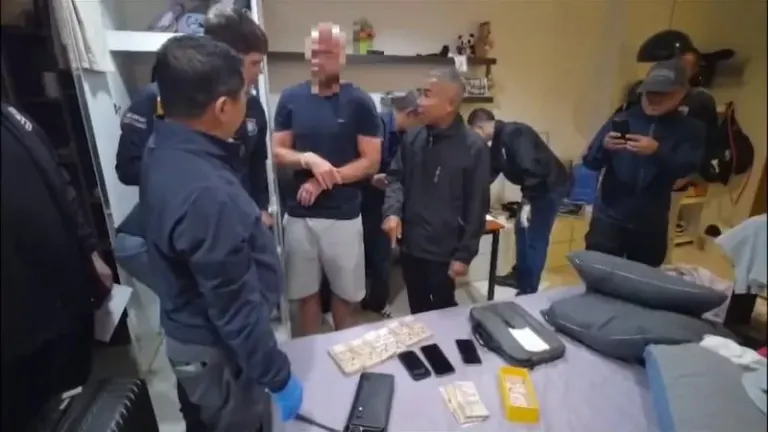 Police Arrest Russians In Online Scam Cash Network