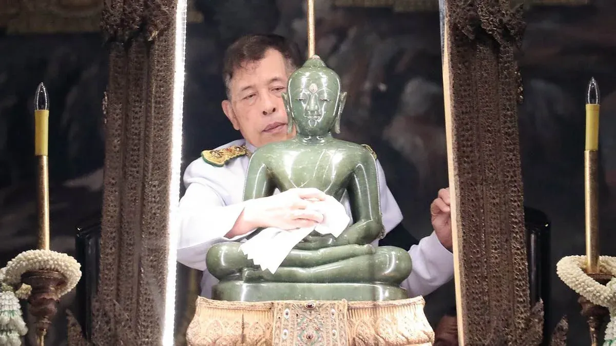 Thai King and Queen Change Buddha Image's Seasonal Regalia