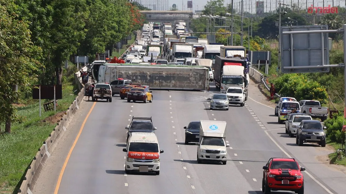 Employee shuttle bus loses control, flips on bridge; 13 factory workers injured, traffic backed up for miles