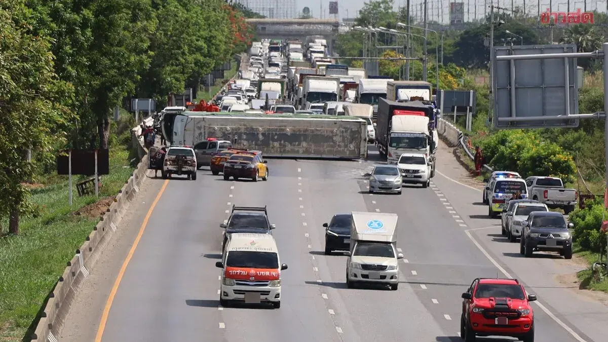 Employee shuttle bus loses control, flips on bridge; 13 factory workers injured, traffic backed up for miles