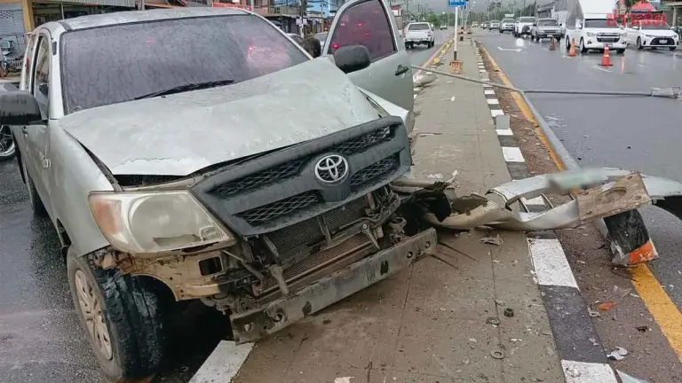 Pickup Truck Crashes Into Power Pole After Skidding in Heavy Rain