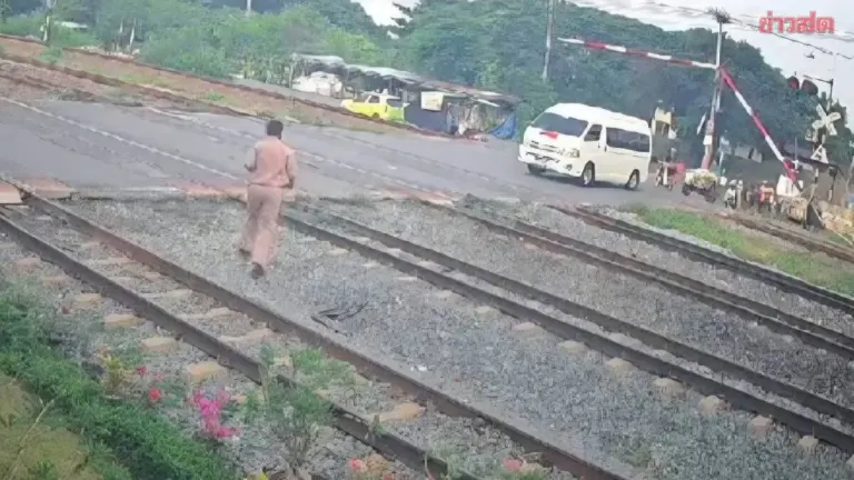Driver of Student Van Identified After Attempting to Run Past Railway Barrier; Police Question Him