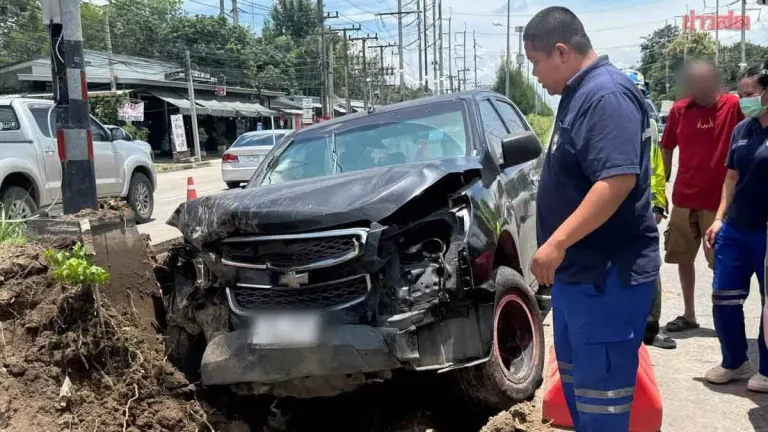 Pickup Truck Crashes Into Barrier, Then Hits Roadside Light Pole