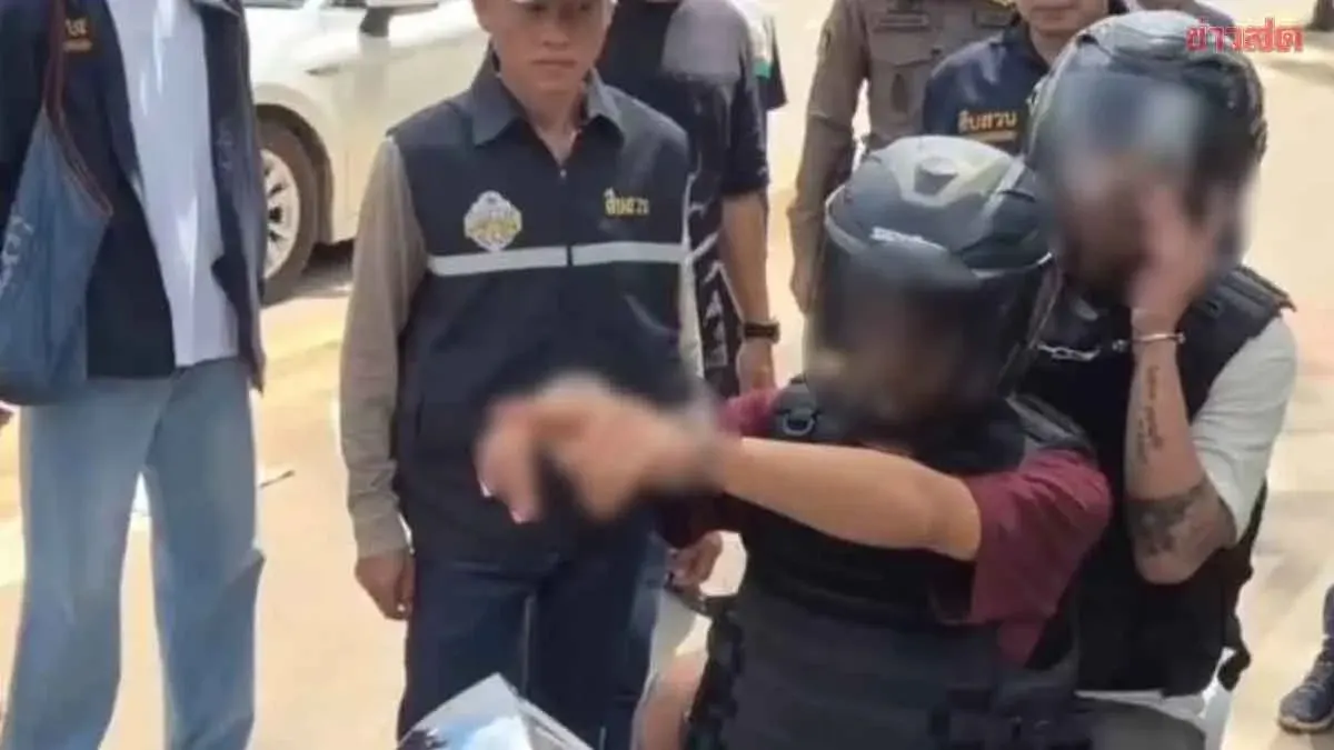 Heavy Police Guard as Shooting Suspect Reenacts Crime Scene