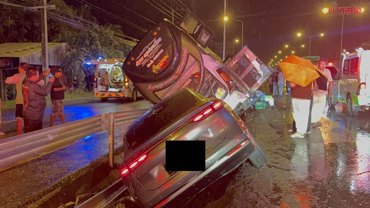 Car Crashes Into Tour Bus on Rainy Highway