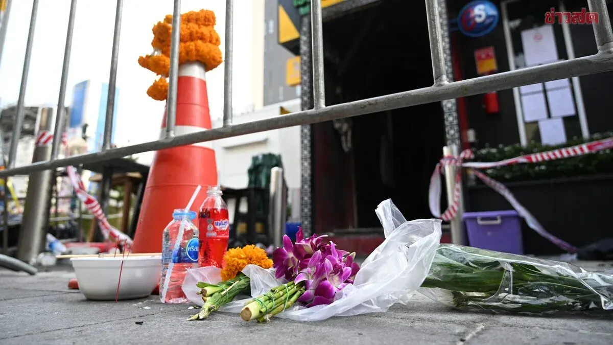 Friends Leave Flowers After Bar Fire Claims Lives, Two Laotians Missing
