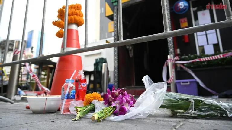Friends Leave Flowers After Bar Fire Claims Lives, Two Laotians Missing