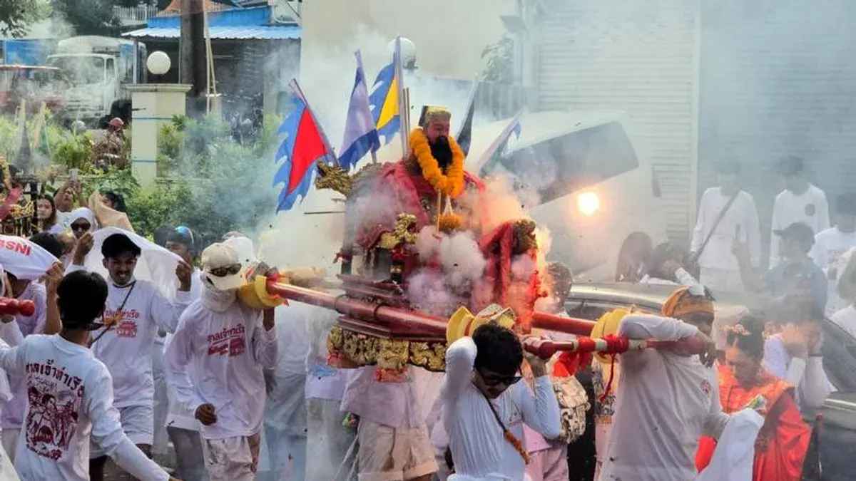 Phuket Vegetarian Festival Procession Draws Crowds of Spectators