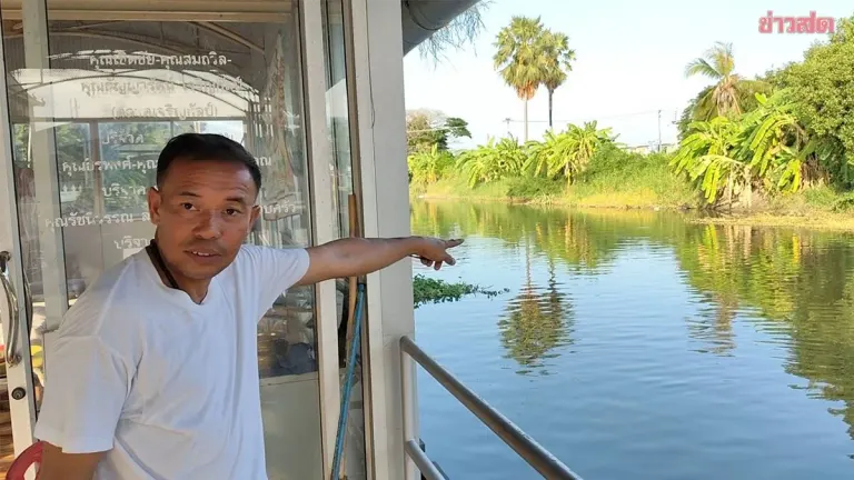 Two Crocodiles Spotted in Canal Near Temple in Pathum Thani