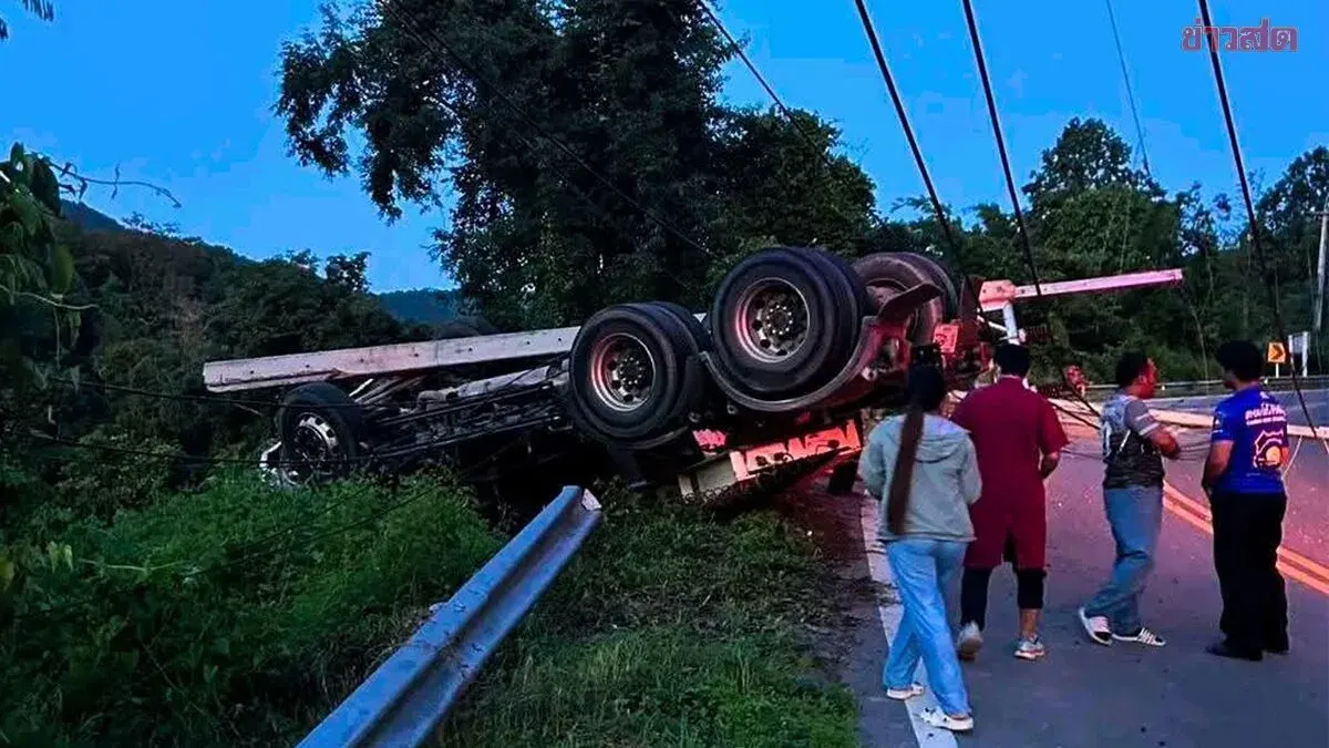 18-Wheel Truck Overturns on Curve, Kills One