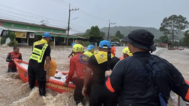 Highway Police Battle Raging Floodwaters to Deliver Aid