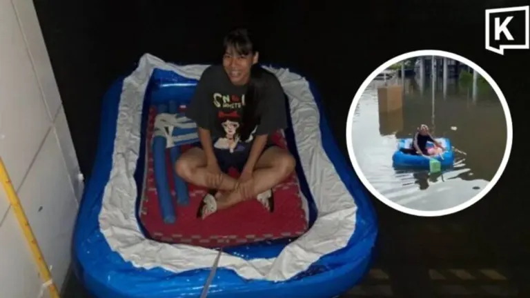 Athletes Use Pool Float as Makeshift Boat During Bangkok Floods