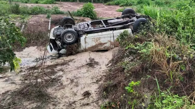 Three Rescued After Pickup Truck Flips in Muddy Road