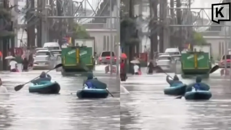 Bangkok Residents Paddle Home by Kayak as Floods Choke Streets
