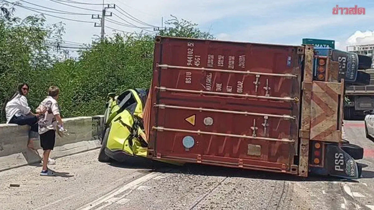 Trailer Flips on Overpass, Crushes EV; Three Injured