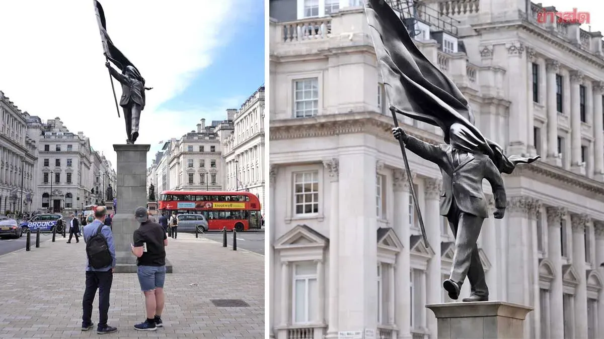 London Abuzz! Statue of Suited Man Holding Flag Covering Face Appears in City Center—Suspected Banksy Work