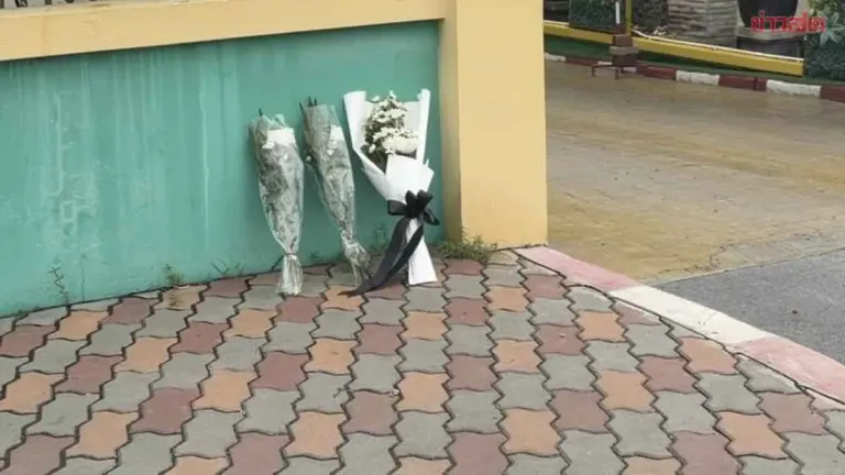 Mourners Leave Flowers as Families Hold Ritual for Victims