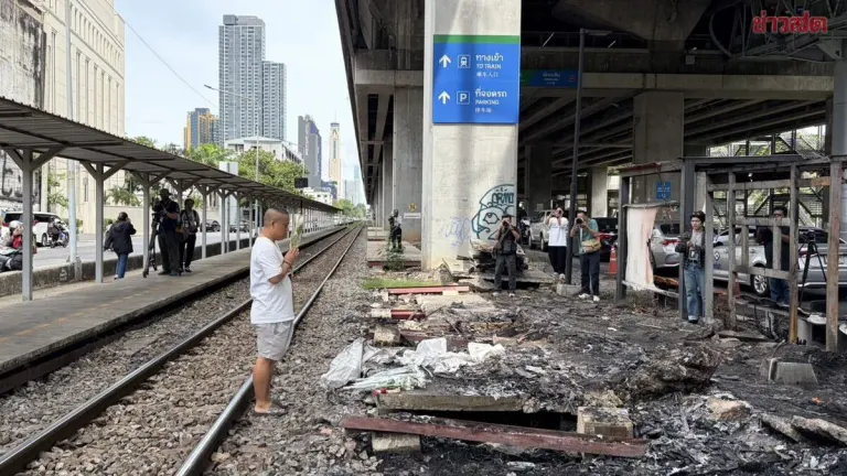Mourners Leave Flowers at Site of Train-Bus Collision That Killed 8
