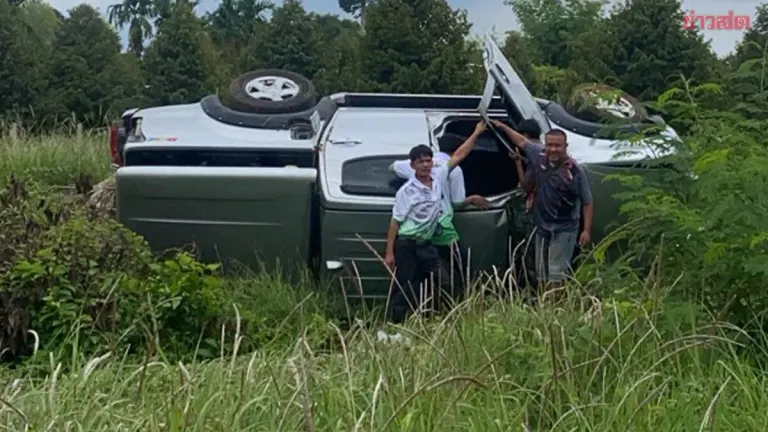 Pickup truck rear-ended at intersection before veering off road and flipping; one dead, one injured