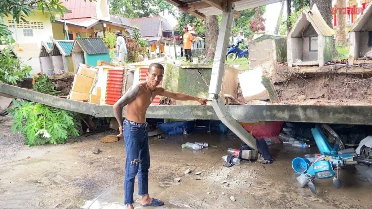 Heavy Rain Collapses Temple Wall, Damages Motorcycles And Cremation Niches